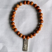 Wooden Stretch Braceletwith Rectangular OM Charm 